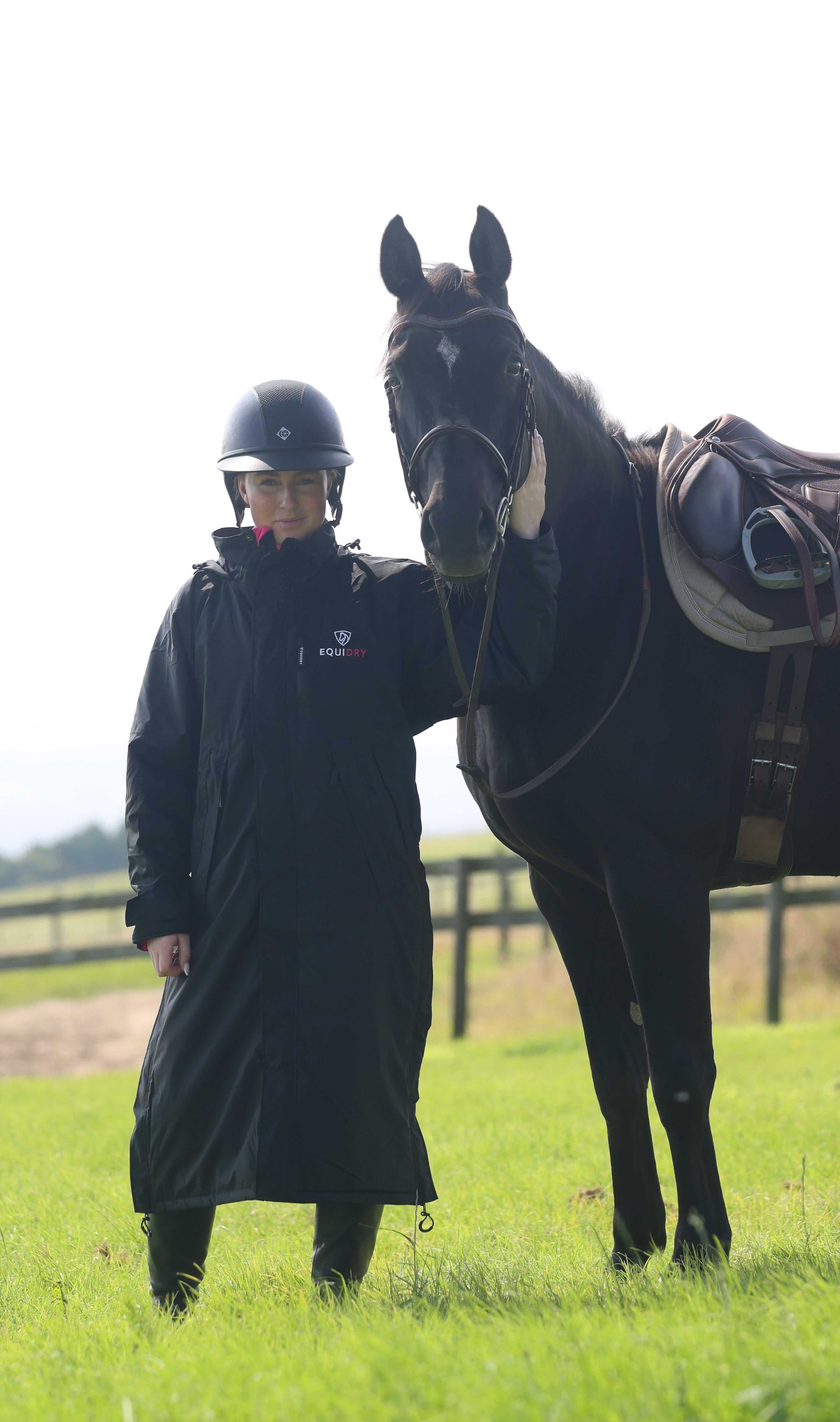 EQUIDRY women's thin fleece long waterproof horse riding coat in black/peacock pink with horse lifestyle 
