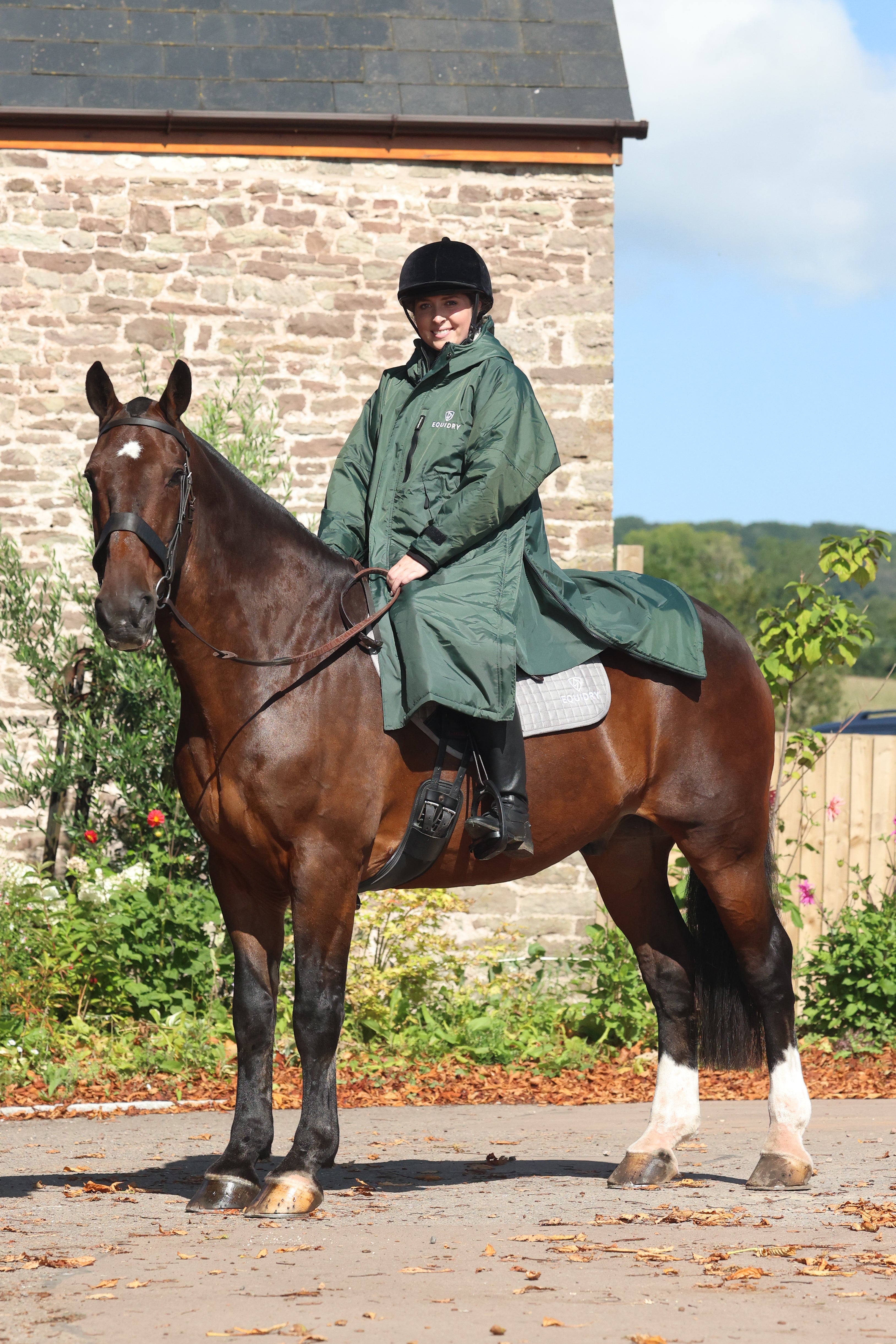 Equidry Women's Waterproof Horse Riding Coat: Fleece-Lined, Forest Green, Rider on Horse