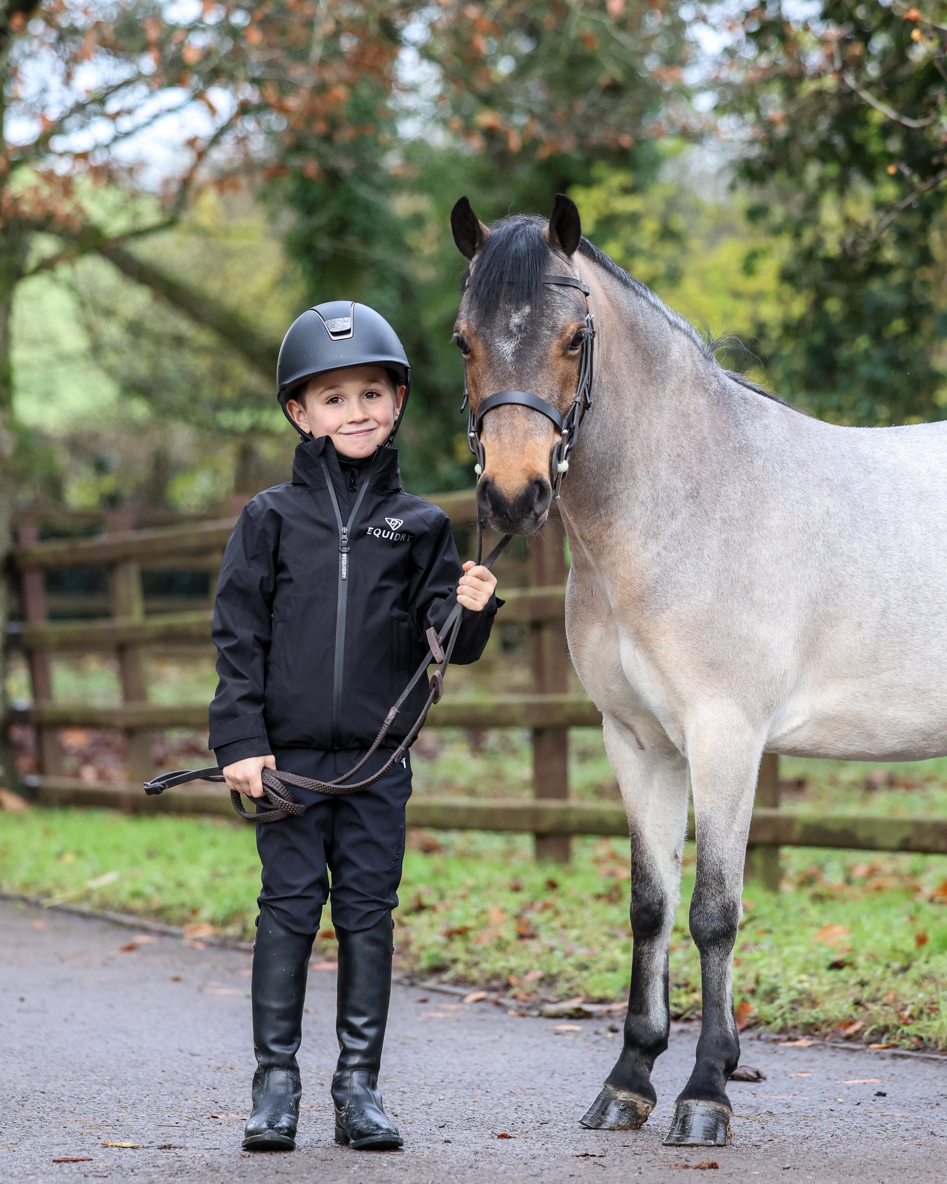 Equidry Nimbus Pack-Away Jacket Children's Black: Boy & Horse. Equestrian Gear for Kids at Equiflair.