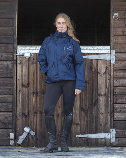 Equidry Shortie Navy Jacket on Woman by Equiflair. Waterproof Riding Gear. Equestrian Fashion.