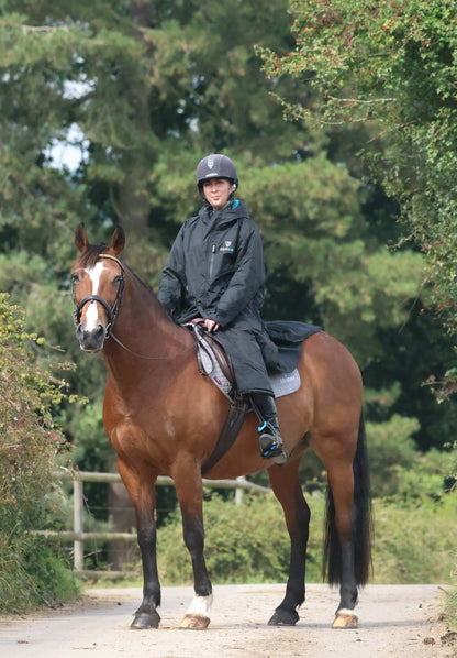 EQUIDRY Black Waterproof Horse Riding Coat: Woman on Horseback