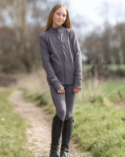 Equestrian Girl in Equidry Grey Zip-Up Top & Riding Leggings. Water Repellent Children's Riding Apparel by Equiflair
