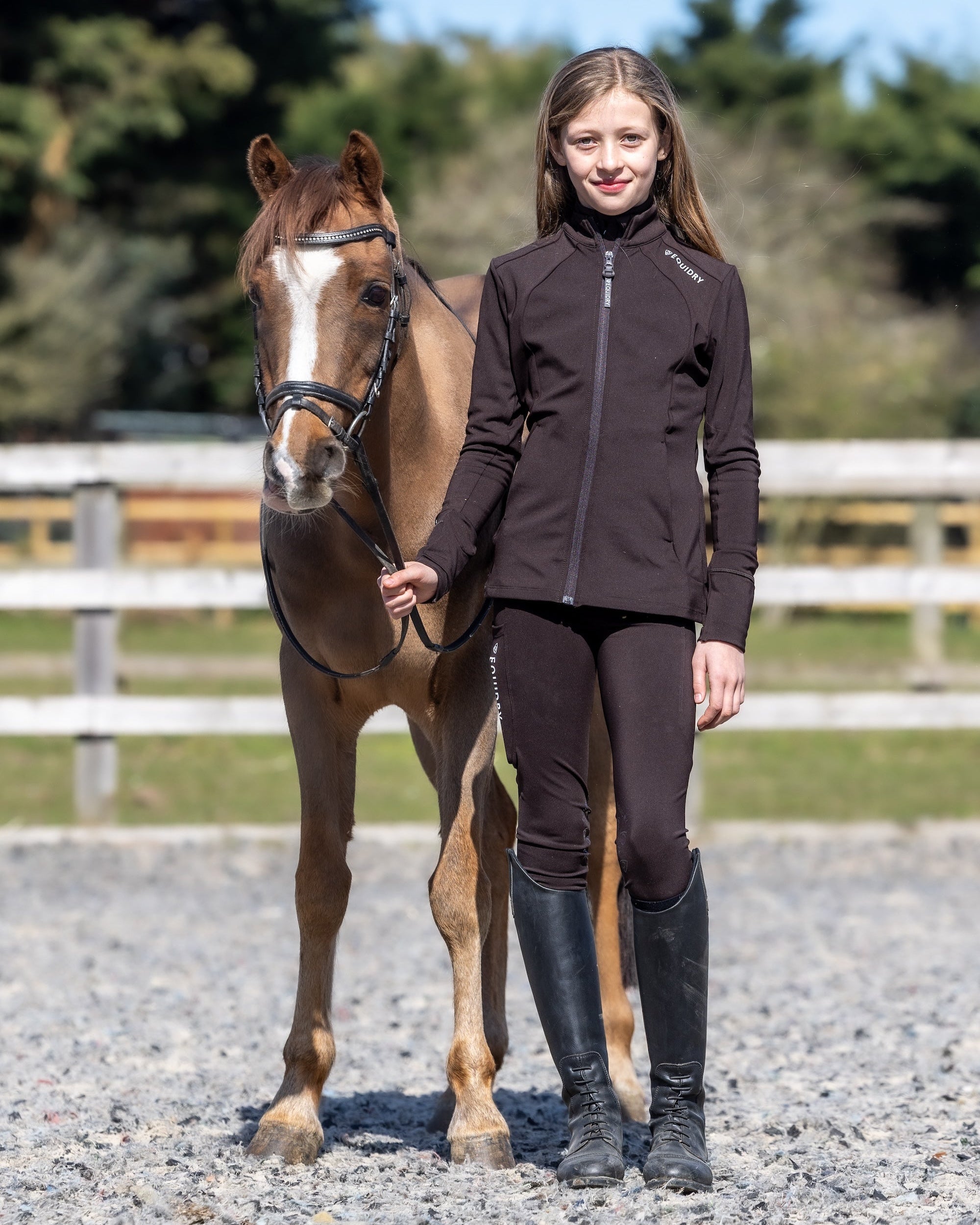 Girl in Equidry Riding Gear with Horse | Brown Water-Repellent Jacket | Kids Equestrian Fashion