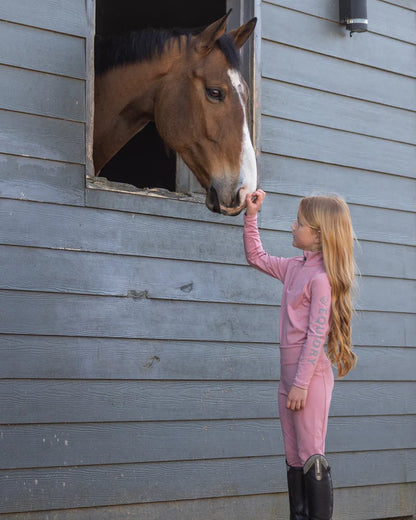 Girl in Equidry Riding Leggings with Horse | Children's Equestrian Apparel by Equiflair
