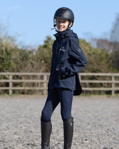 Girl in Equidry Waterproof Riding Jacket - Equestrian Apparel