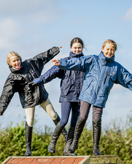 Shortie Child's Oversized Short Waterproof blouson style Riding Jacket Thin Fleece Lining Stowaway Hood in steel blue, black/peacock pink, navy 