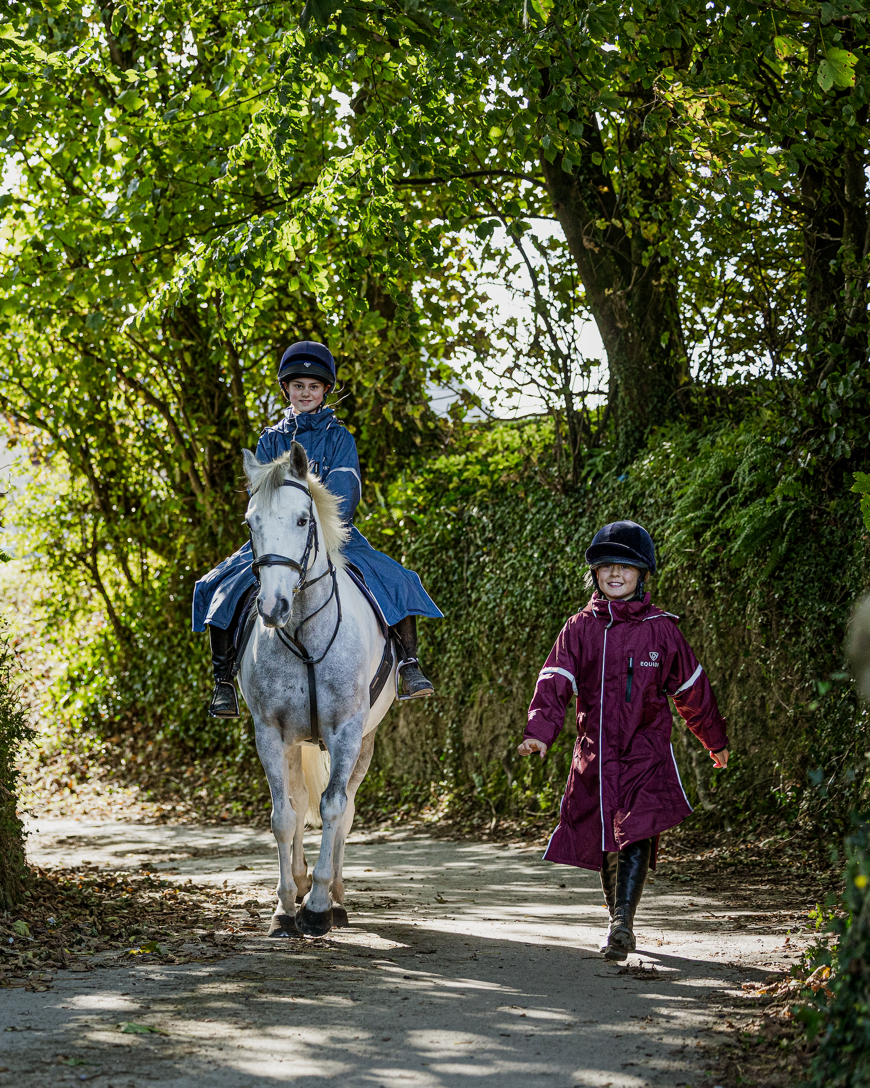 Kids Horse Riding: Equidry Waterproof Raincoat, Girl on Horse, Child Walking Outdoors