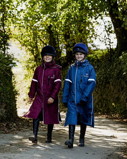 EQUIDRY Kids Waterproof Horse Riding Raincoats: Children's Plum & Steel Blue Equestrian Jackets Walking on Path