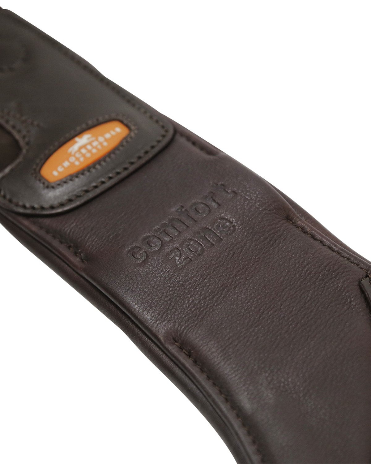SCHOCKEMOHLE Comfort Zone Horse Girth - Close up on premium leather and Comfort Zone embossed detailing
