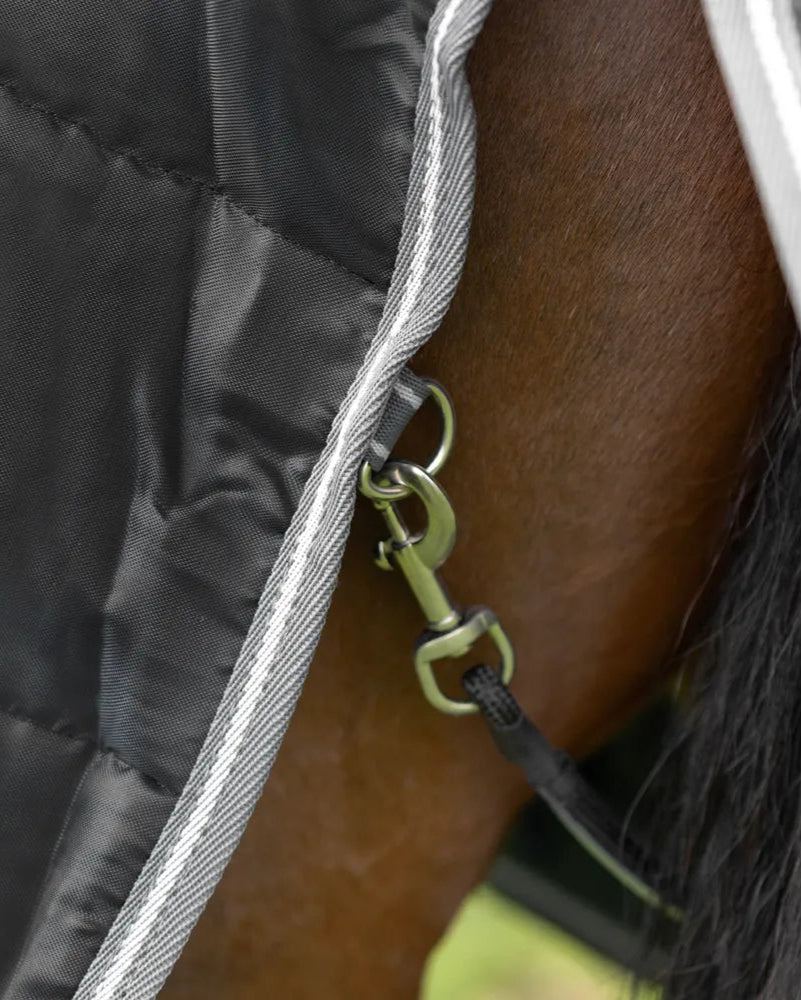 StormX Empra black stable rug detail: clip, horse, equine blanket.