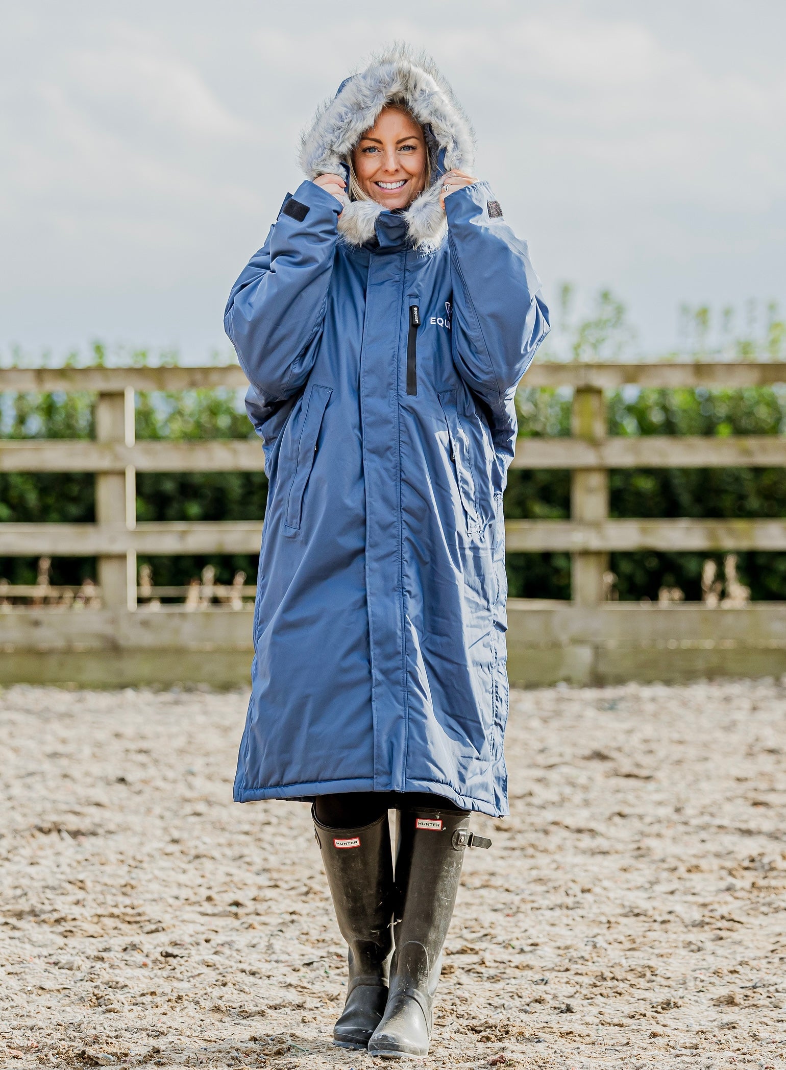 Equidry Steel Blue Women's Waterproof Horse Riding Coat. Fleece Lined with Faux Fur Hood, warm winter equestrian apparel.