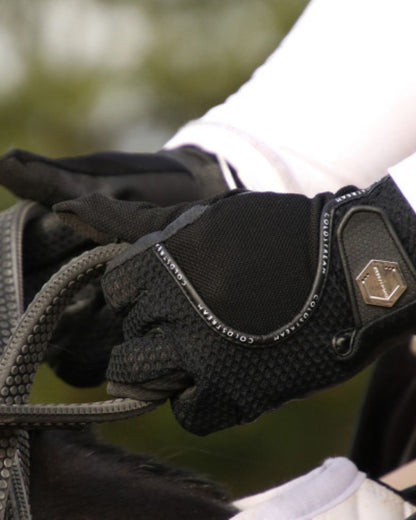 COLDSTREAM Black Mesh Riding Gloves: Summer Equestrian Gear for Grip & Comfort. Horse Rider Holding Reins.