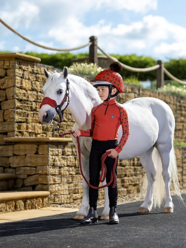 Child in LeMieux Sienna Base Layer with Horse: Equestrian riding gear, kids riding outfit, LeMieux Mini Base Layer, pony.