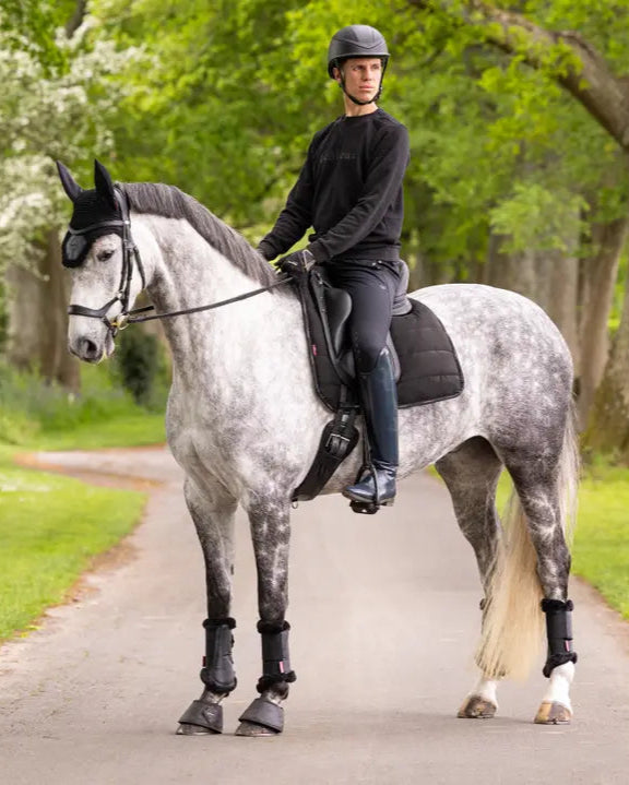 Dressage Horse & Rider with LeMieux Black Saddle Pad: Equestrian Sportswear by Equiflair