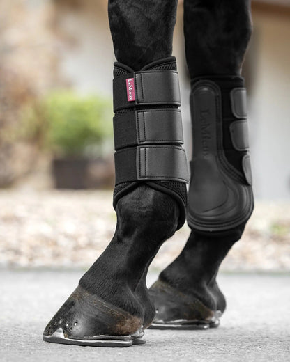 Black LeMieux Mesh Brushing Boots on Horse Legs - Equestrian Leg Protection