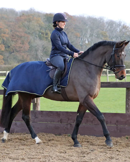 Woman Riding Horse with StormX Waterproof Exercise Sheet - Navy, Equiflair | Horse Riding Gear - Exercise Rug Horse.…
