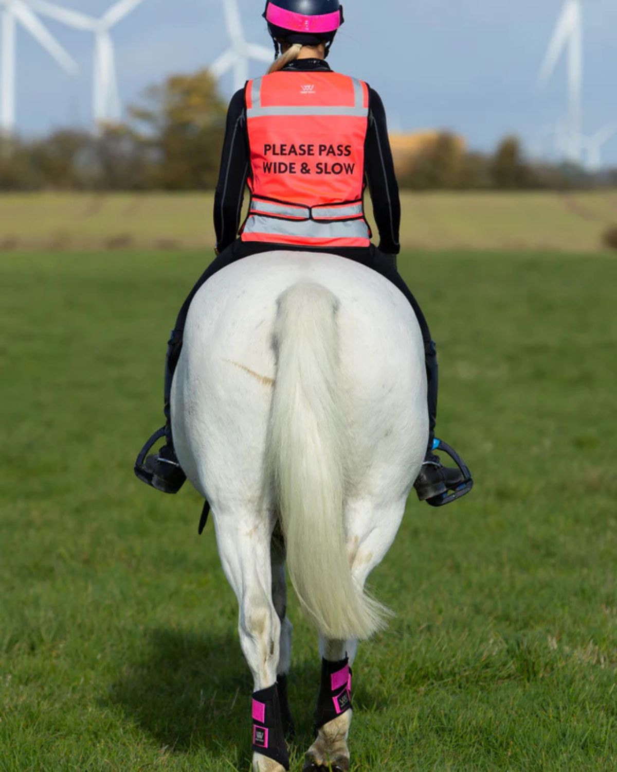 WOOF WEAR Hi Vis Pink Riding Vest: "PLEASE PASS WIDE & SLOW" for safe horse riding. Reflective, high visibility.