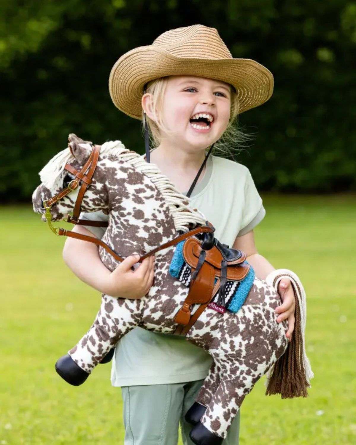 LEMIEUX Toy Pony Western Pad Azure - Equiflair, Girl with toy horse wearing cowboy hat