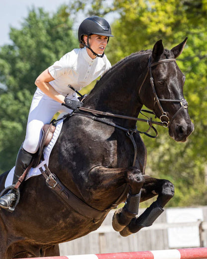 Equestrian Rider Jumps Wearing Woof Wear Vision Competition Shirt White | Equiflair