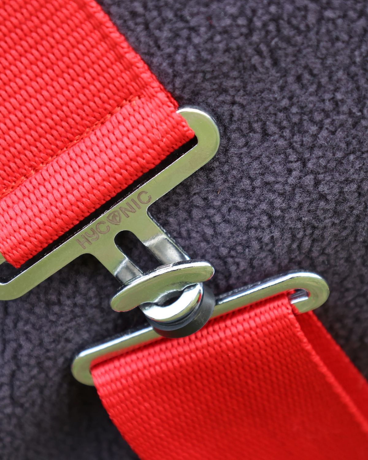 HYCONIC Fleece Rug Charcoal/Red Detail: Close-up of Buckle and Strap on Horse Rug - Equiflair