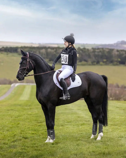 Equestrian: Rider on Horse Wearing LEMIEUX Self-Cool Close Contact Square Saddle Pad Arctic White from Equiflair for Riding