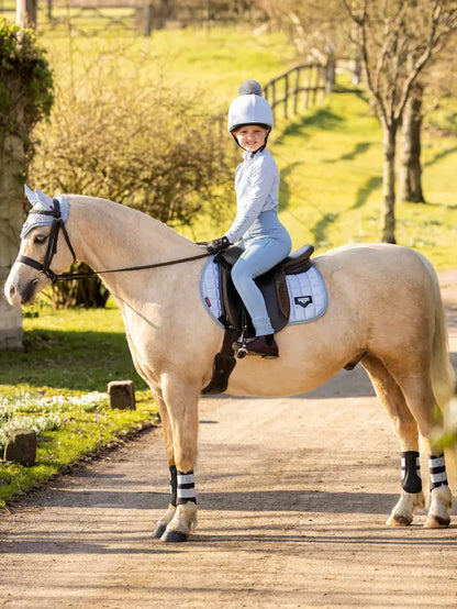 LeMieux Junior Loire Fly Hood Mist on Pony: Young Equestrian Rider in Matching Set