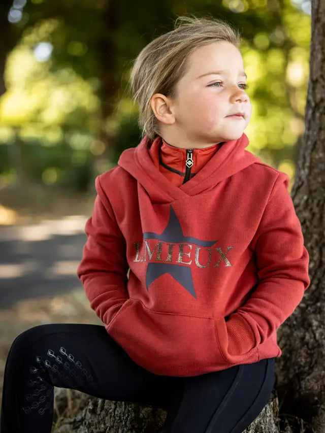 LeMieux Mini Hoodie Sienna: Young girl wearing a comfortable equestrian riding hoodie for children from Equiflair.