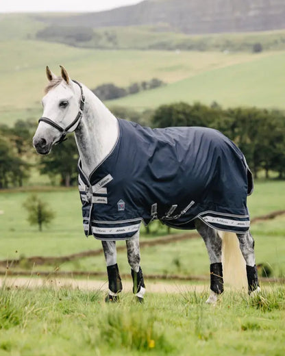 Gray Horse Wearing LeMieux Arika Featherweight 0G Navy Rug - Equiflair Equestrian Equipment