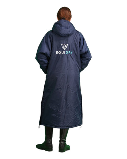 EQUIDRY women's long waterproof horse riding coat in Navy/Turquoise studio full length back of coat 