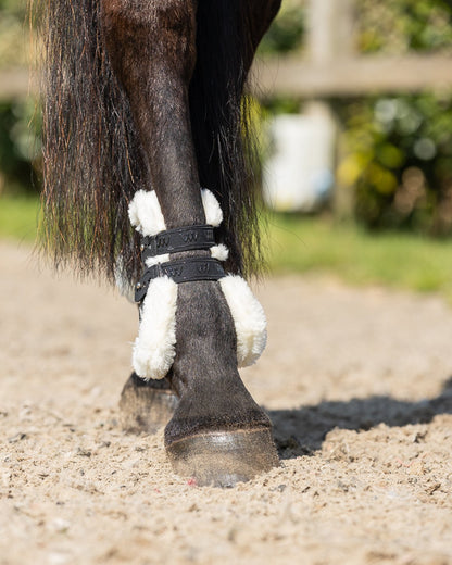 WOOF WEAR Vision Elegance Fetlock Boot: Black Faux Sheepskin Protection for Horse Leg | Equiflair