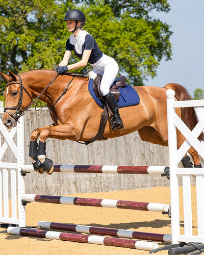 Equestrian Horse Jumping with Woof Wear Dressage Sheepskin Pad Navy | Equiflair