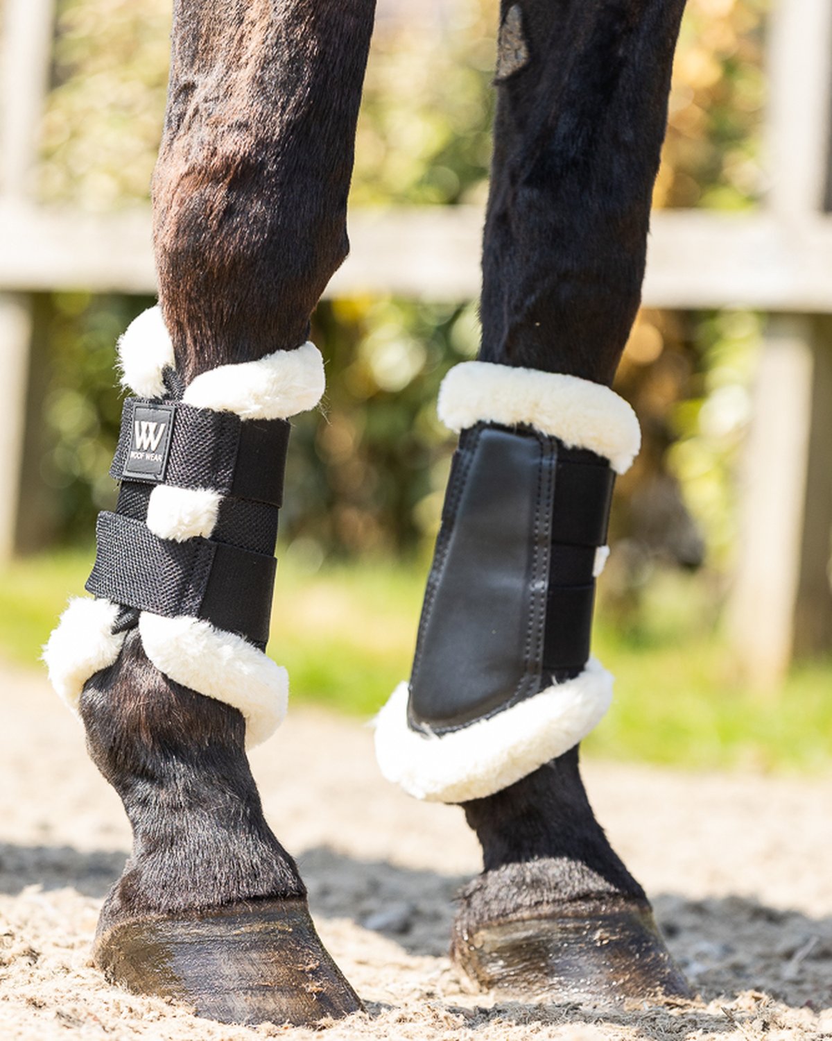 WOOF WEAR VISION ELEGANCE BRUSHING BOOT BLACK: Protective horse leg boots with faux fur lining from Equiflair, enhanced protection.