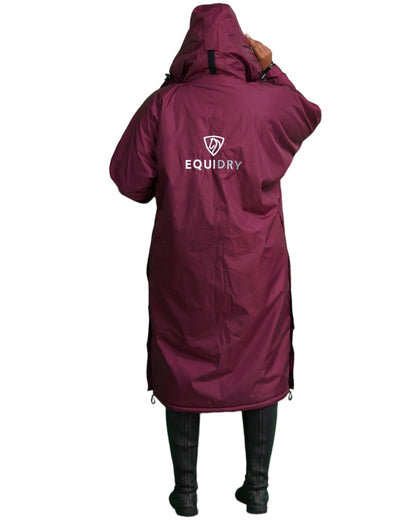 EQUIDRY Evolution Pro women's Warm Waterproof Horse Riding Coat Thick Fleece Lining Stowaway Hood in Plum full back of coat