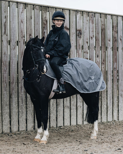 Equidry Waterproof Exercise Sheet (Grey) on Horse with Young Rider | Equiflair