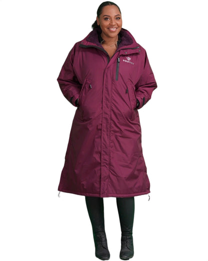 Evolution Pro women's Warm Waterproof Horse Riding Coat Thick Fleece Lining Stowaway Hood Plum  image of full front of coat