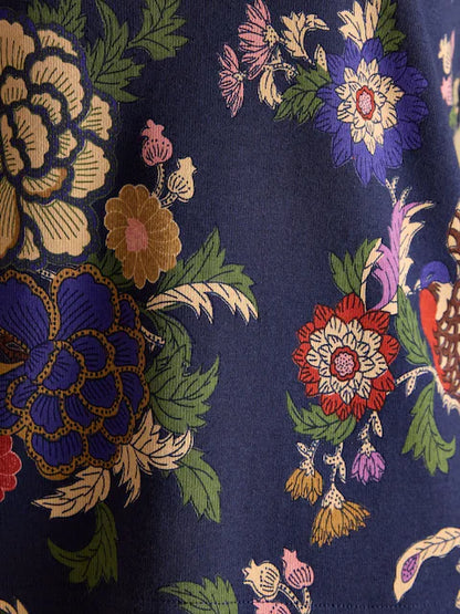 JOULES PRINTED HARBOUR NAVY BIRD floral pattern top; navy background with colorful flower and bird motifs.