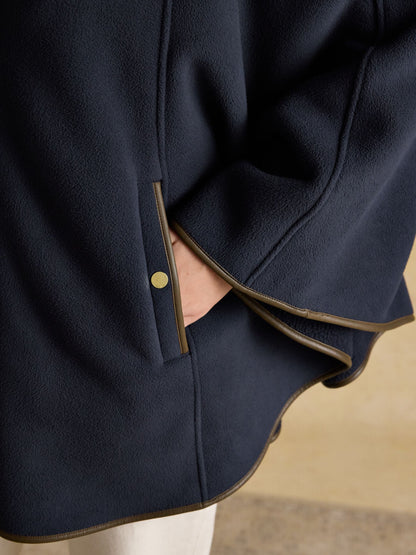 Joules Heritage navy polar fleece longline cape with faux leather trim and popper pockets.