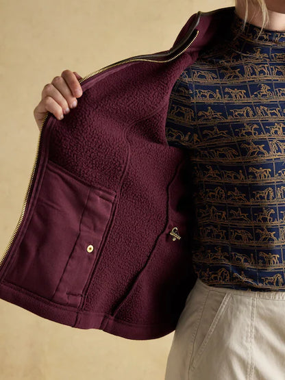 Joules Heritage Red Fleece Gilet: Women's sleeveless vest with a cozy fleece lining and classic styling.