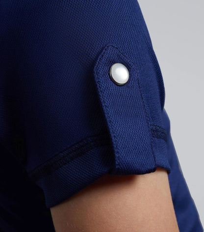 PREMIER EQUINE girl's navy riding top sleeve detail. Technical fabric, popper cuff. Comfortable & breathable equestrian apparel.