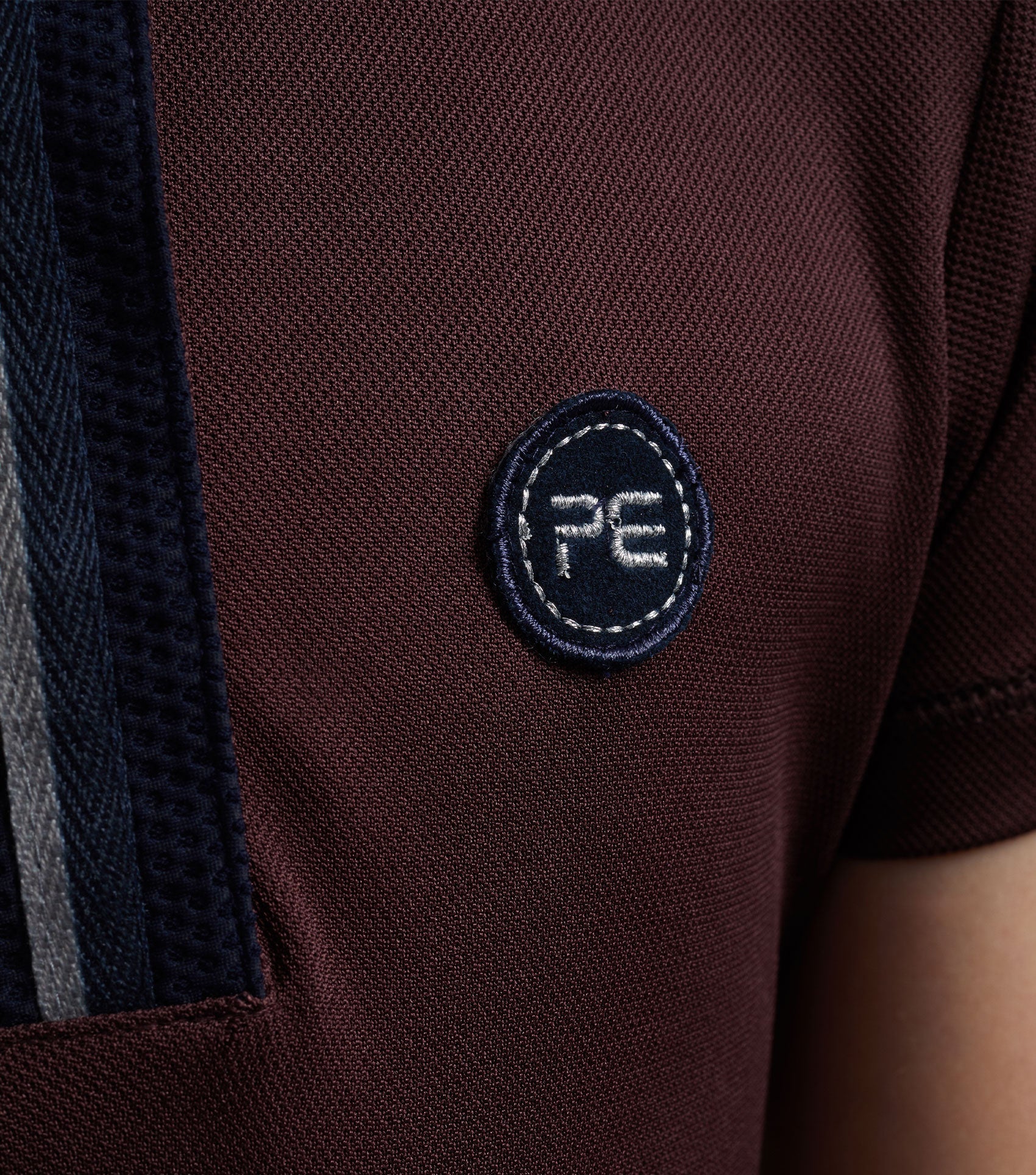 Premier Equine Girl's Wine Riding Top: Technical, Breathable Comfort for Young Equestrians. Shop Now!