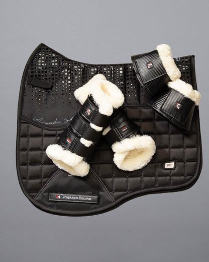 Premier Equine Armada black dressage saddle pad with wool brushing boots, horse riding equipment