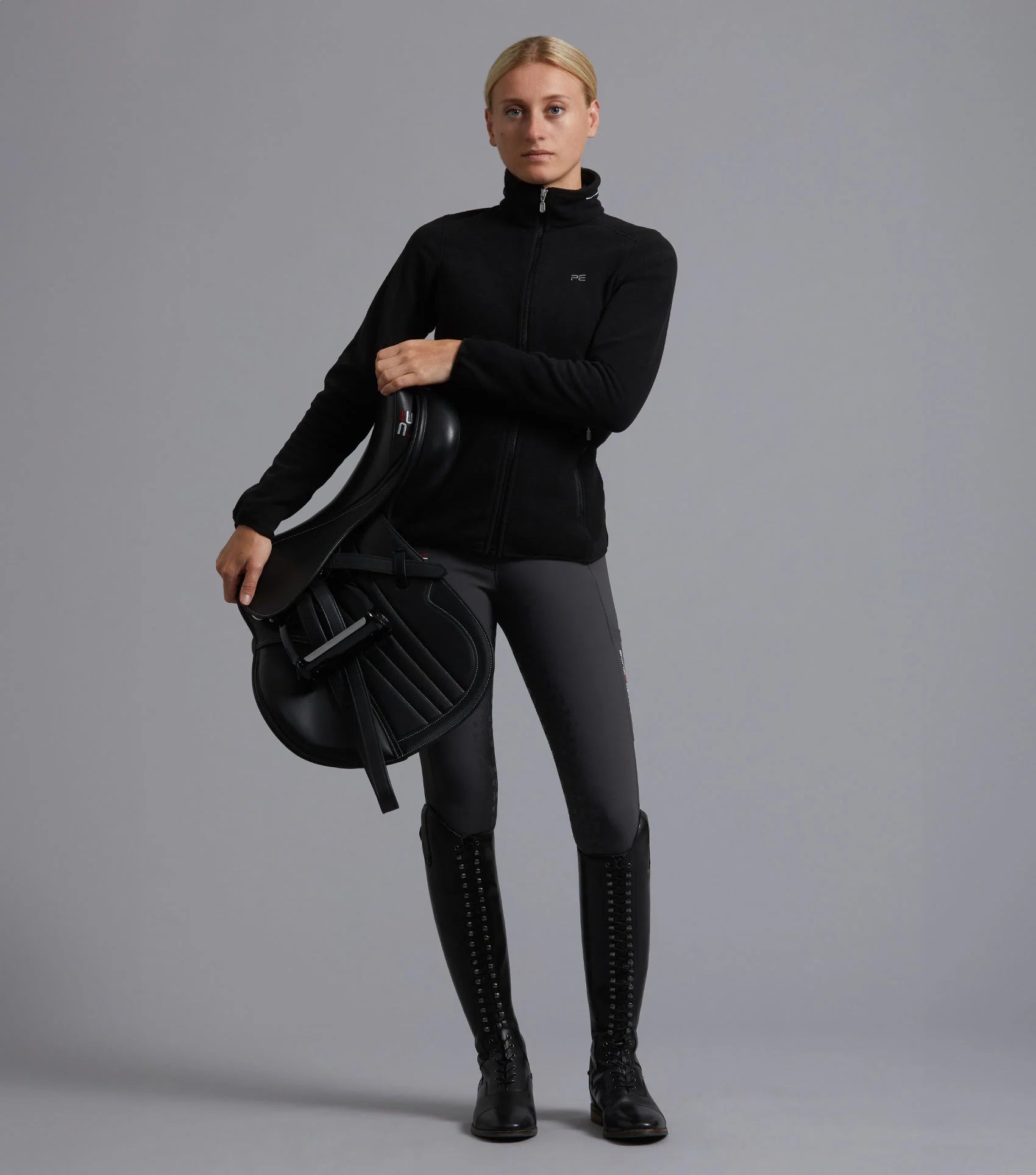 Premier Equine Ascendo Black Microfleece Riding Top: Stylish equestrian apparel for women, perfect for riding and casual wear.