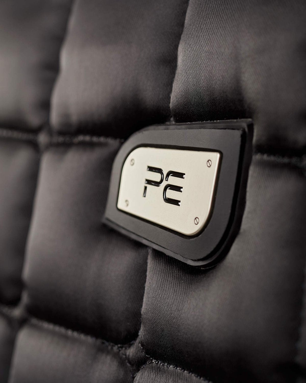 Premier Equine Atlantis CC Satin Black Dressage Saddle Pad with Wool Lining and PE Logo. Quilted Satin Design.