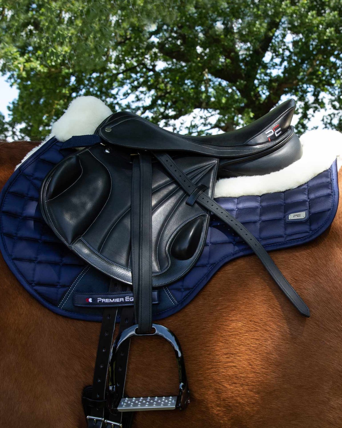 PREMIER EQUINE Atlantis Saddle Pad: Navy Wool GP/Jump Square, Equiflair. Equestrian Equipment