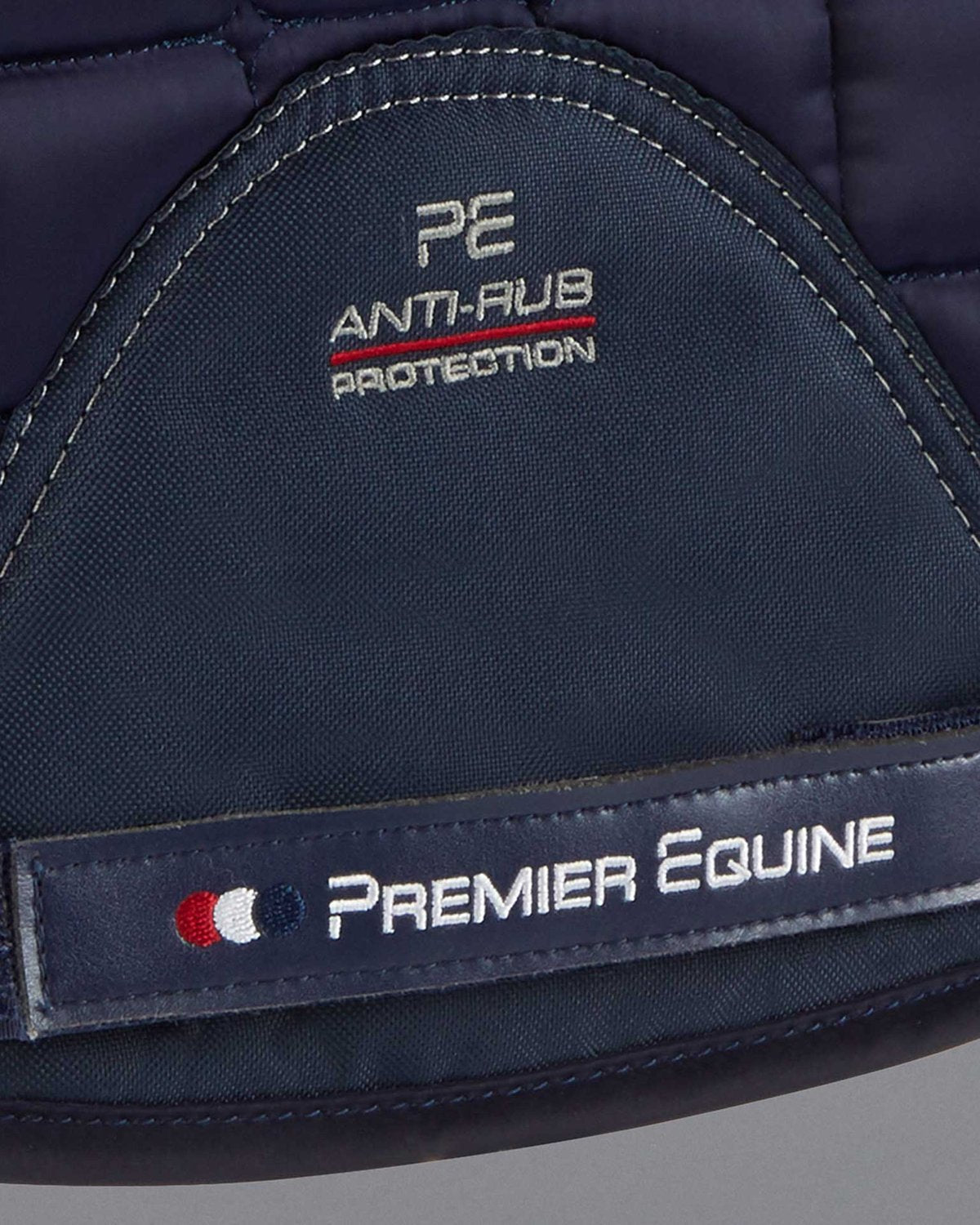 Premier Equine Anti-Rub Saddle Pad - Close-Up of Logo and Design for Horse Riding Comfort and Protection