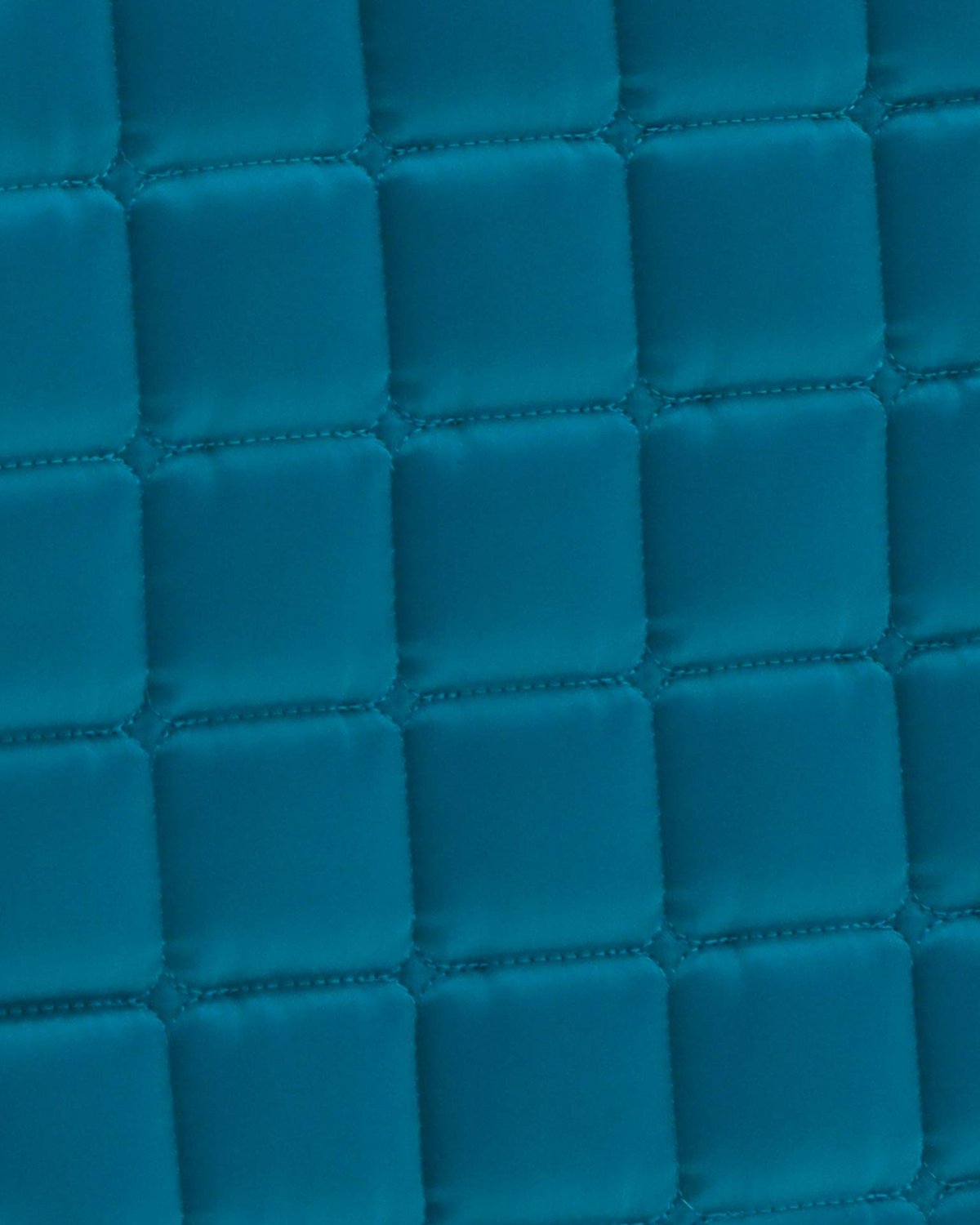 Turquoise Quilted Dressage Saddle Pad: Satin Anti-Slip Close-Up | Premier Equine Style