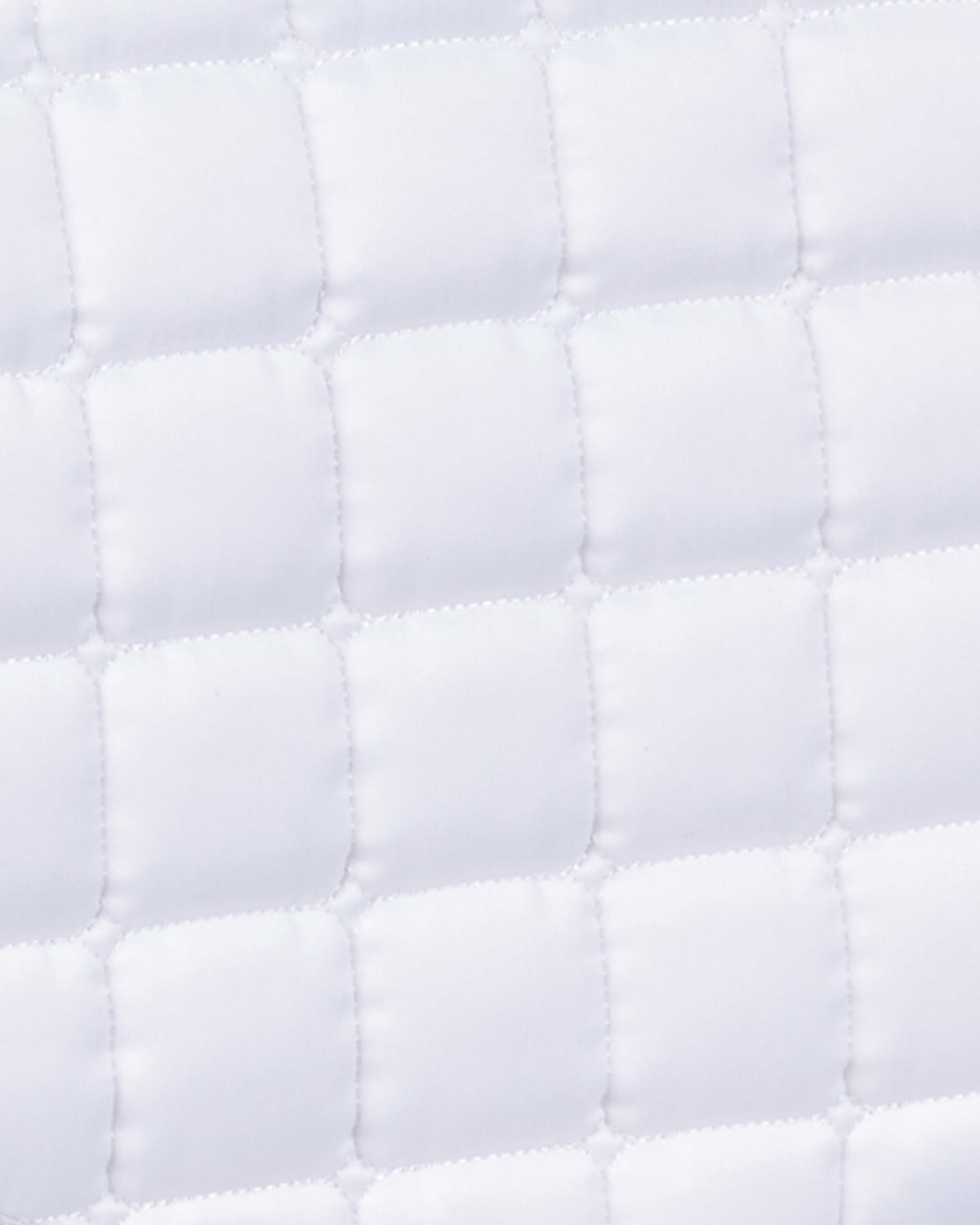Premier Equine White Quilted Dressage Saddle Pad - Anti-Slip Tech Grip. Luxurious and functional equestrian accessory.