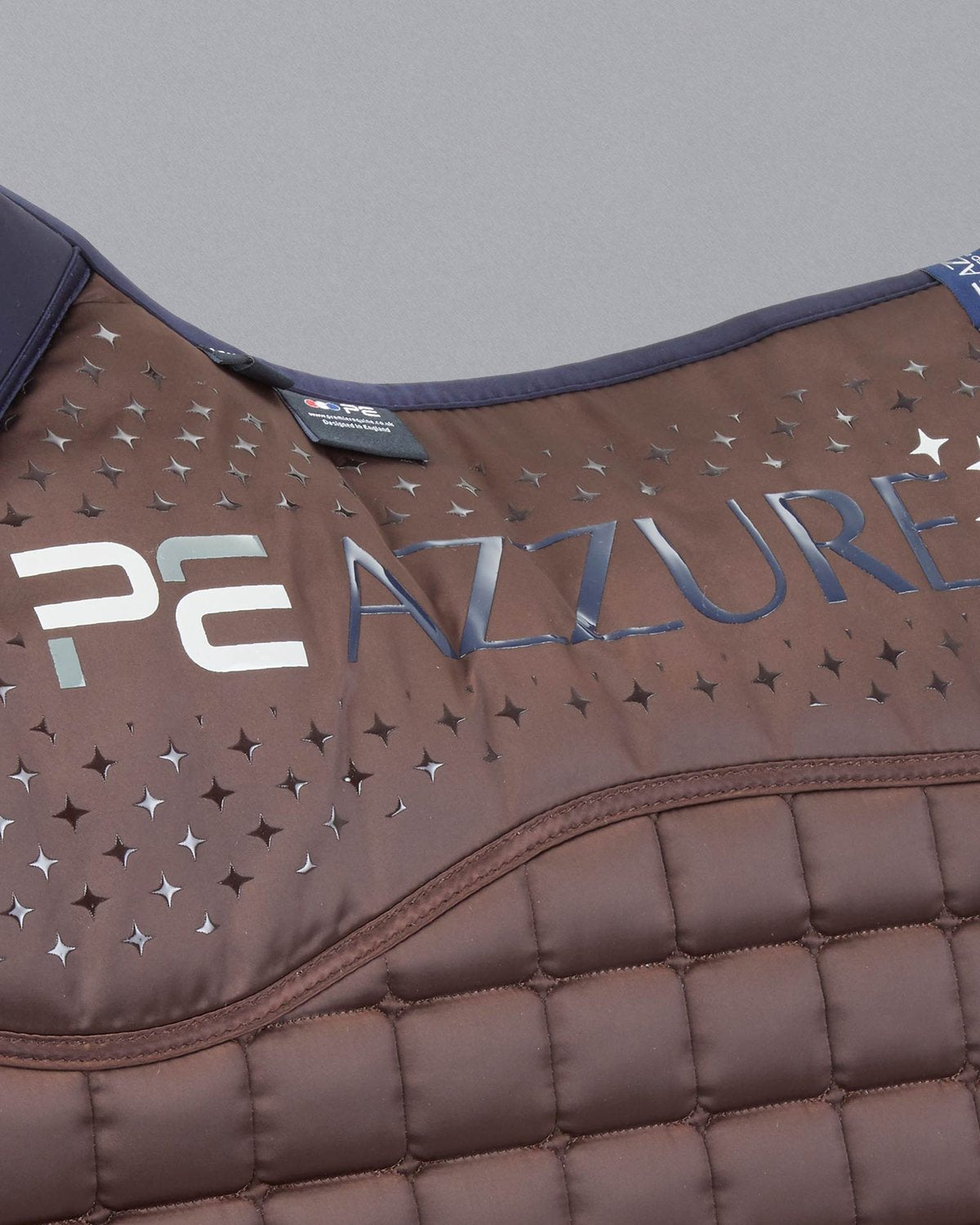 Premier Equine Azzure Brown Saddle Pad: Anti-Slip GP/Jump Square with Quilted Design & Star Perforations