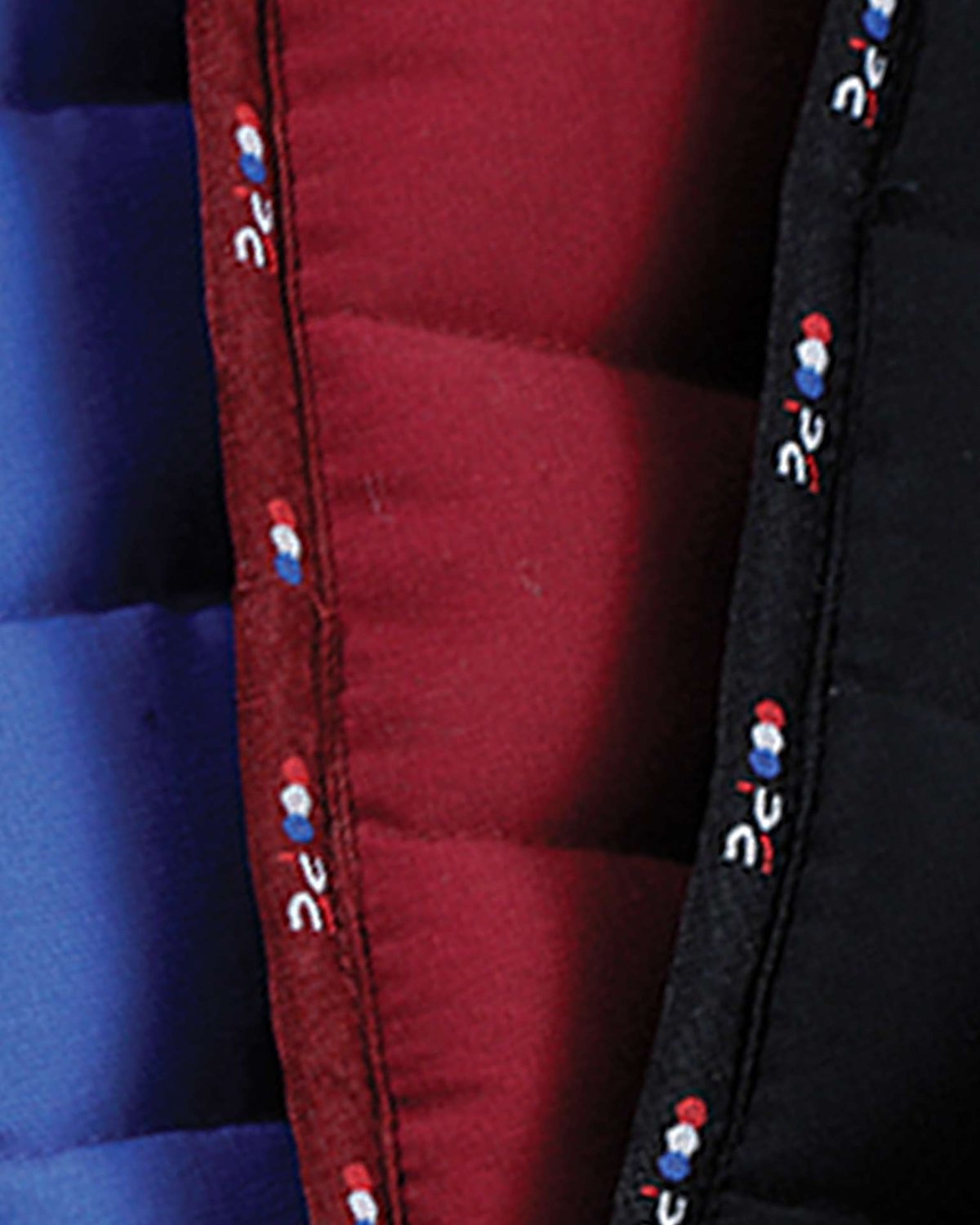 Premier Equine Reversible Saddle Pad - Burgundy/Blue/Black Close-up. Versatile equestrian accessory.