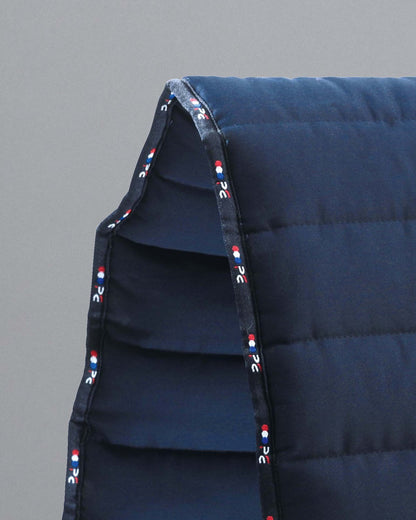 PREMIER EQUINE BUSTER Reversible Saddle Pad in Navy. Equine saddle pad for horse riding and training, closeup view.